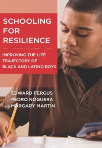 Cover image of Schooling for Resilience: Improving the Life Trajectory of Black and Latino Boys. Written by Edward Fergus, Pedro Noguera, and Margary Martin