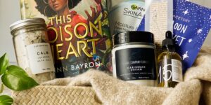 Black-owned book subscription box with self-care items from Satisfiction